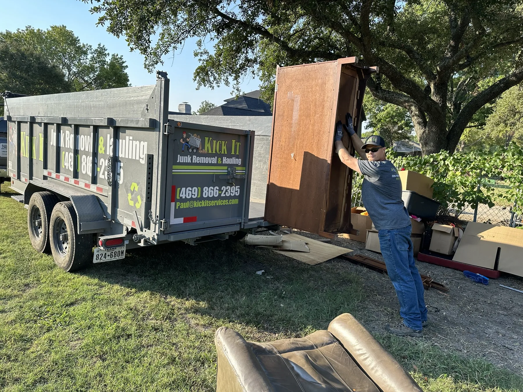Office furniture and equipment loaded for removal by Kick It