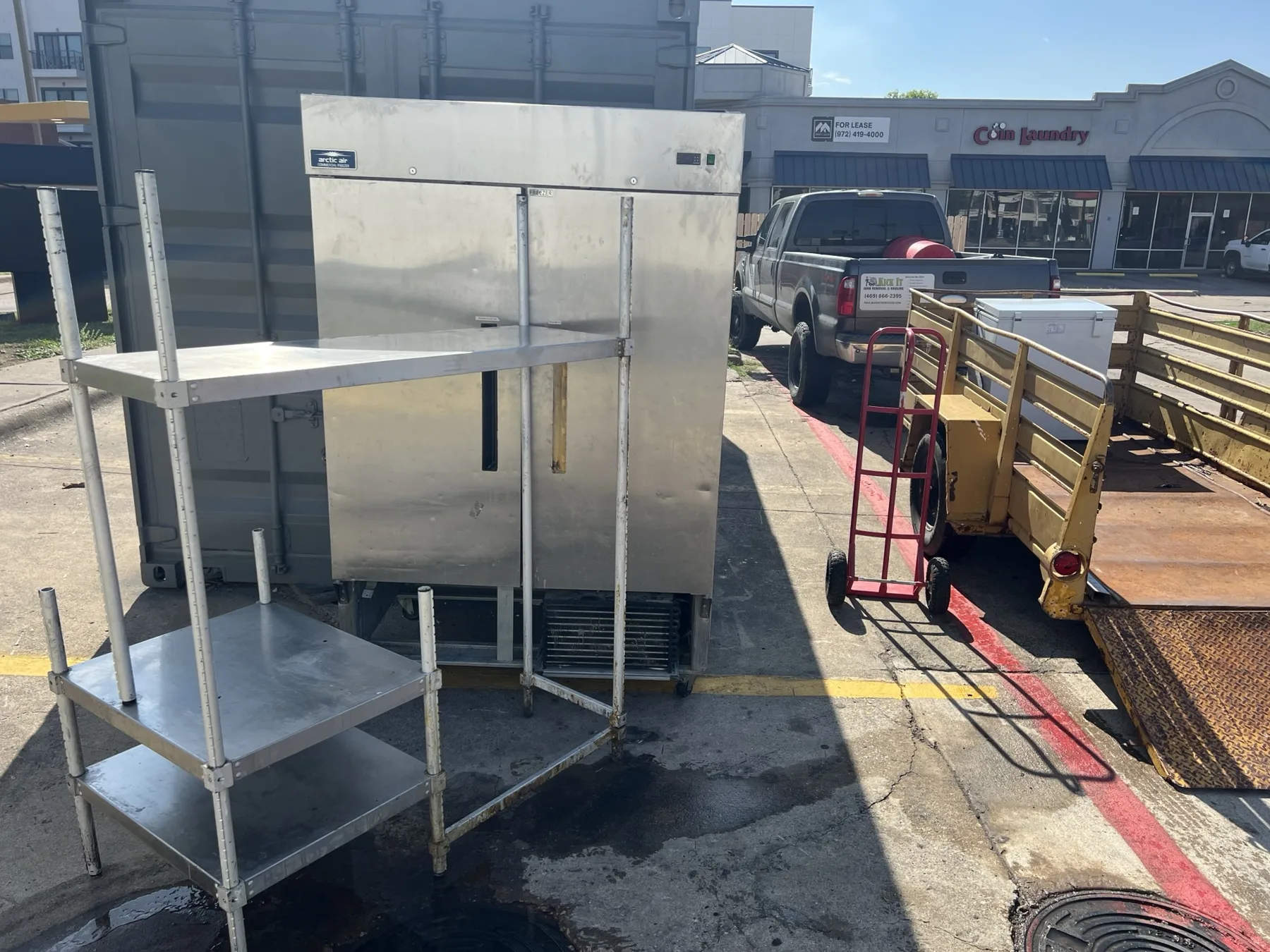 Stainless restaurant equipment loaded on the Kick It trailer