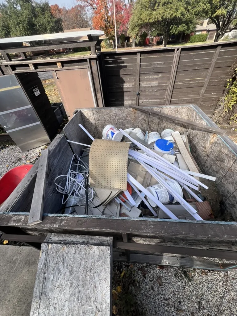 Renovation debris loaded in the Kick It trailer